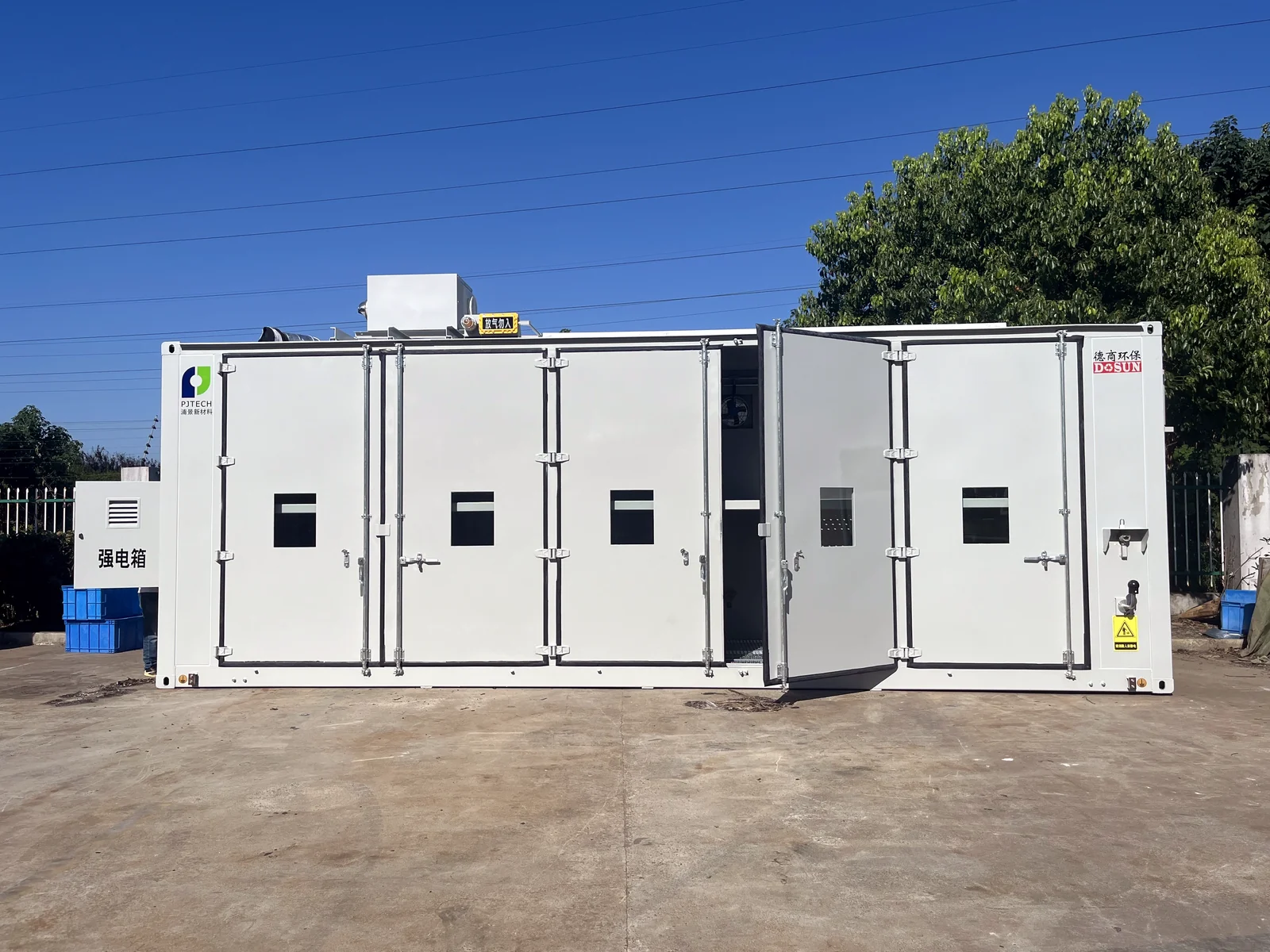 Outdoor hazardous material storage container with multiple secure doors