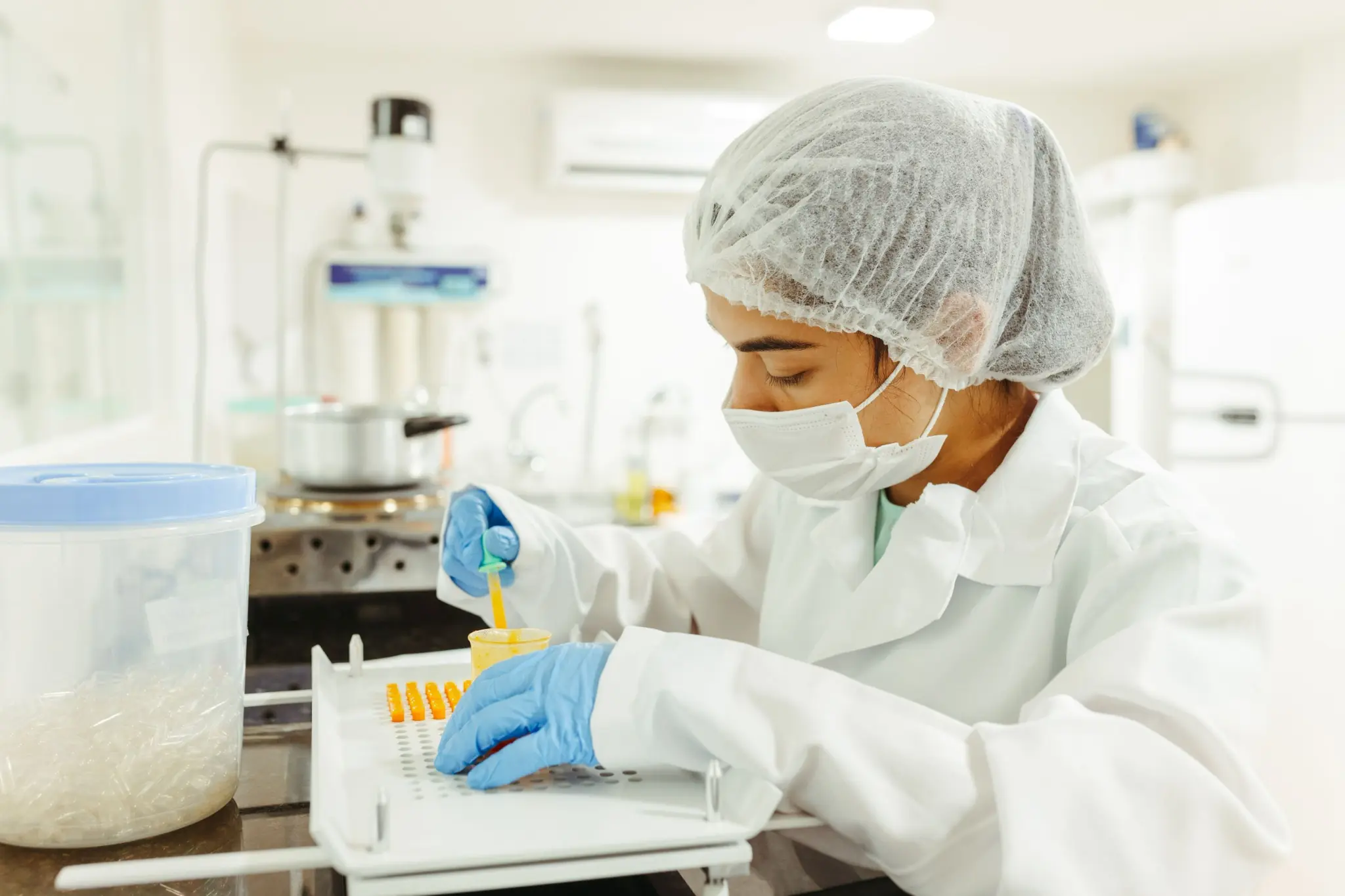 Laboratory technician preparing samples for analysis in a modern laboratory