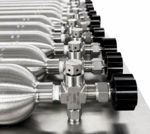 Stainless steel sampling cylinders fitted with needle valves