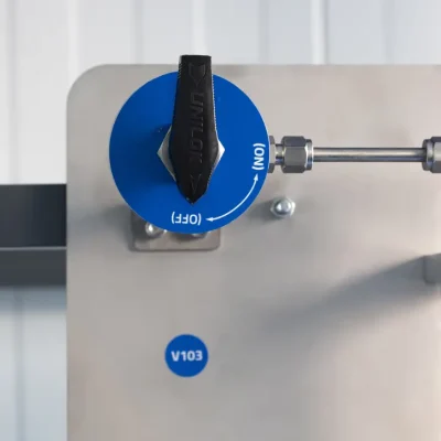 Blue isolation valve control on a wall-mounted sampling system